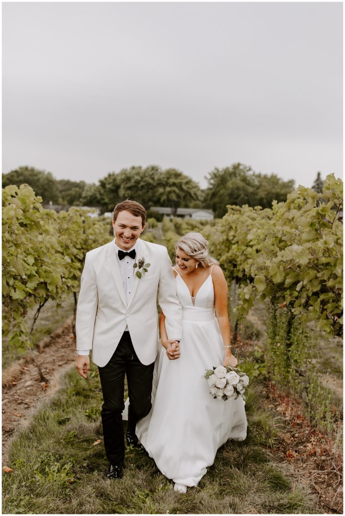 Bride and Groom on wedding day in vineyard