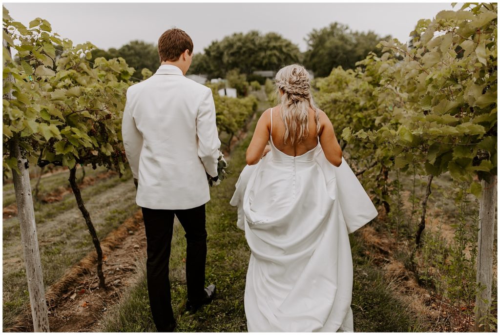 Bride and Groom on wedding day in vineyard