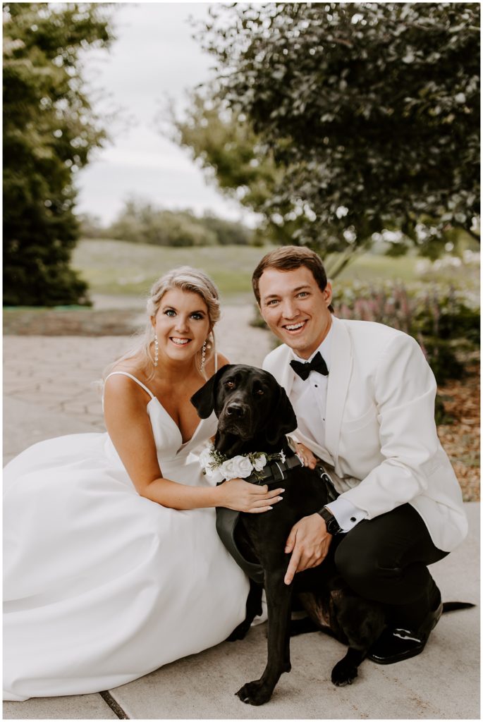 Bride and groom with dog