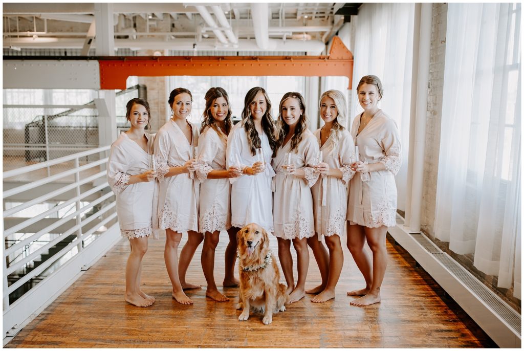 Bride and bridesmaids with dog