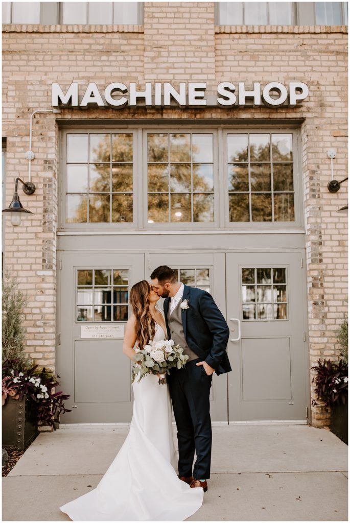 Bride and Groom on wedding day at machine shop